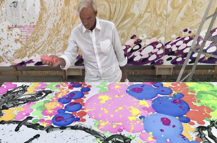 Tom Everhart in studio in front of Big Poppa painting